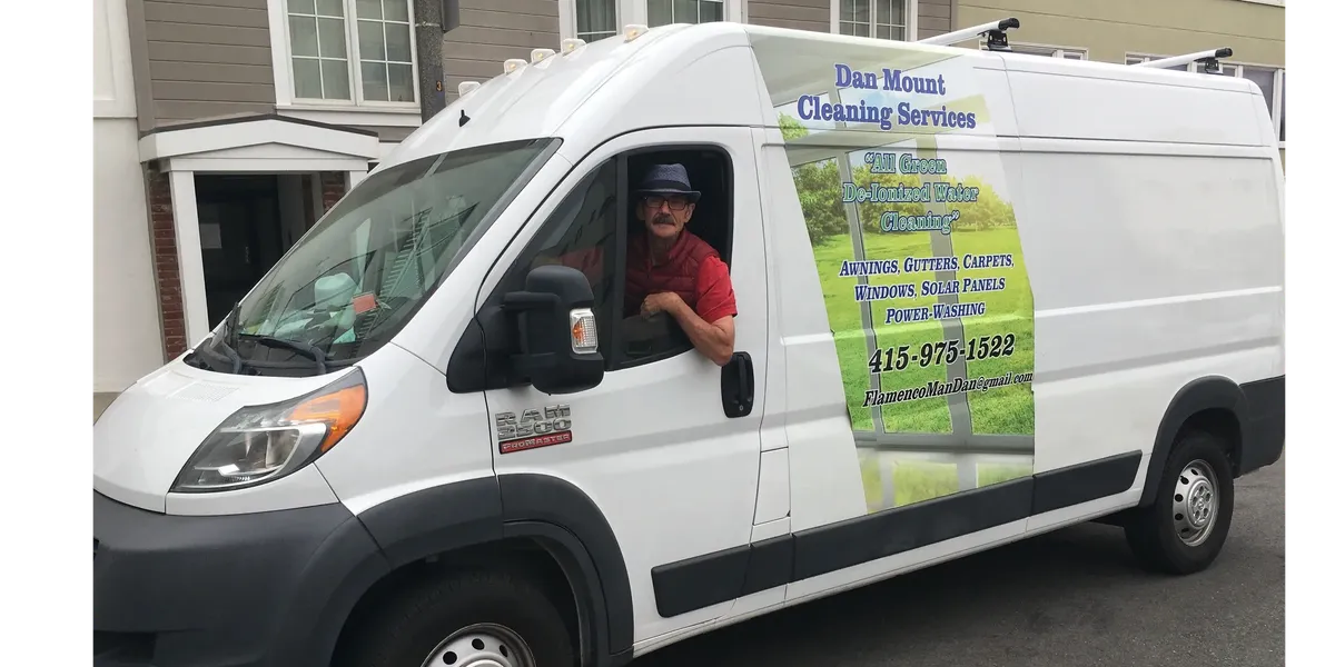 Dan Mount in the Dan Mount Cleaning Services van
