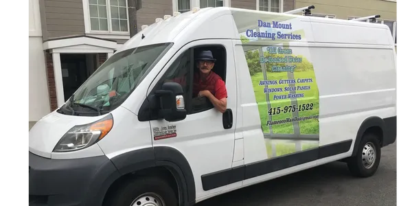 Dan Mount in the Dan Mount Cleaning Services van