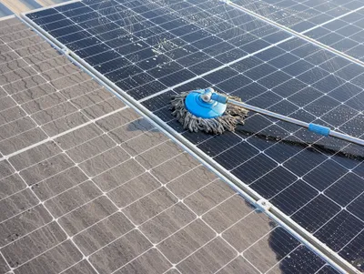 Solar panels being cleaned